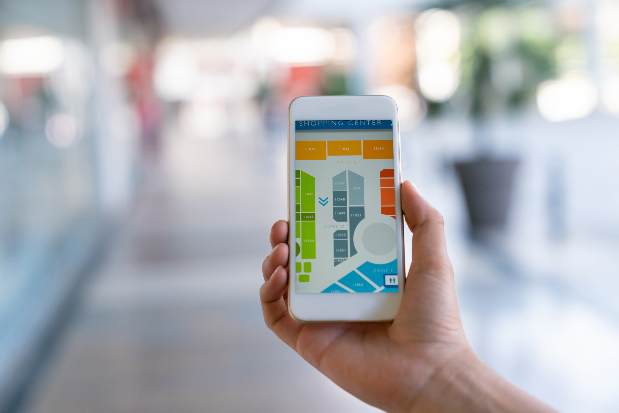 hand holding phone with indoor navigation map 